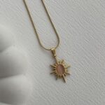 Çelik Pembe Kaplan Gözü Güneş Tasarım Gold Kolye
