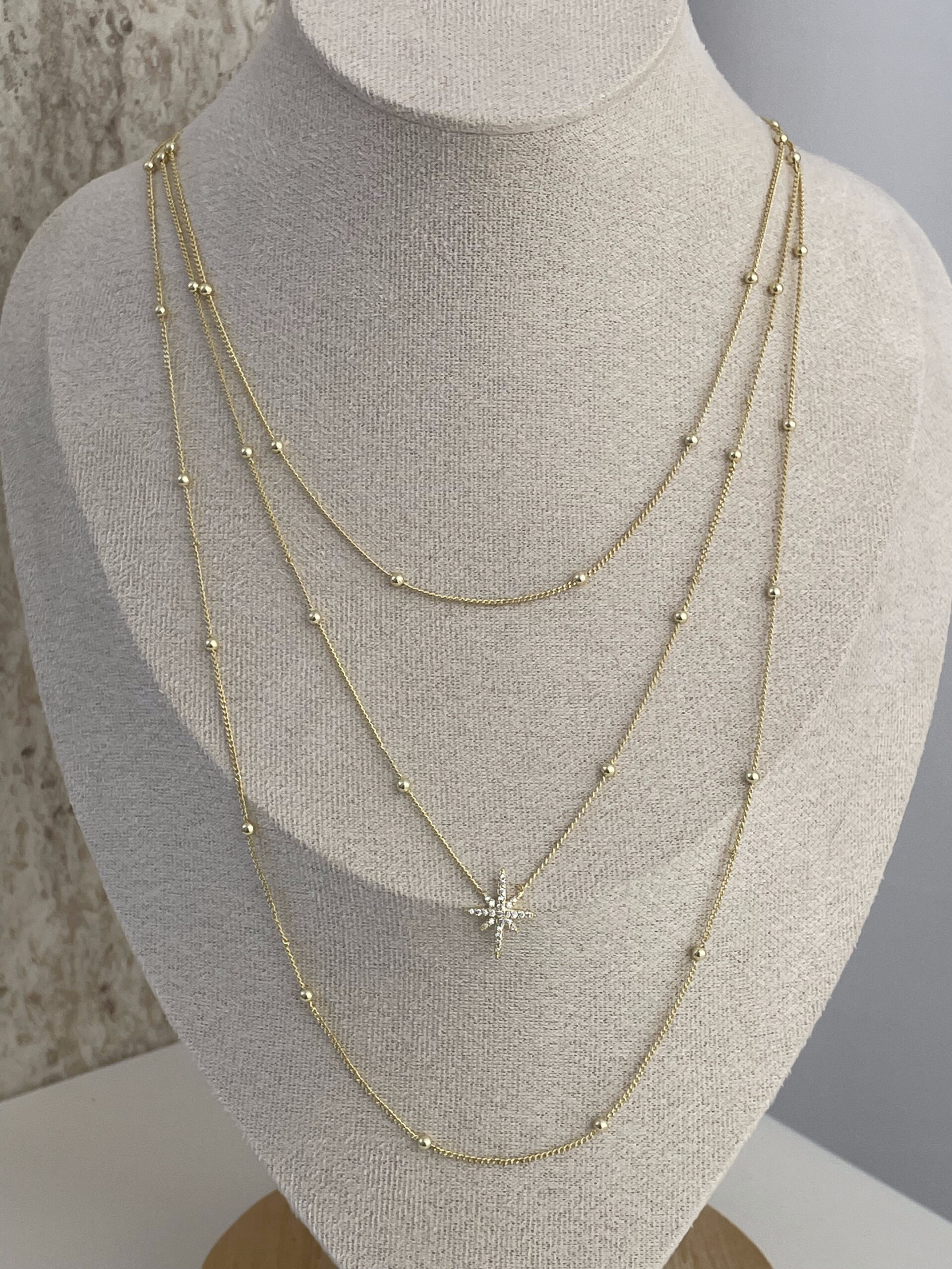 1773320661_0_69b2b9d5b19c0.jpg Özel Seri Zirkon Taşlı Minik Top Yıldız Detay İnce Üçlü Gold Kolye